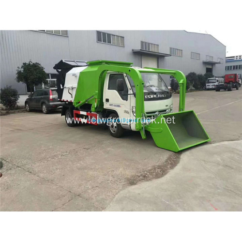 Front loading animal innocuous treatment vehicle